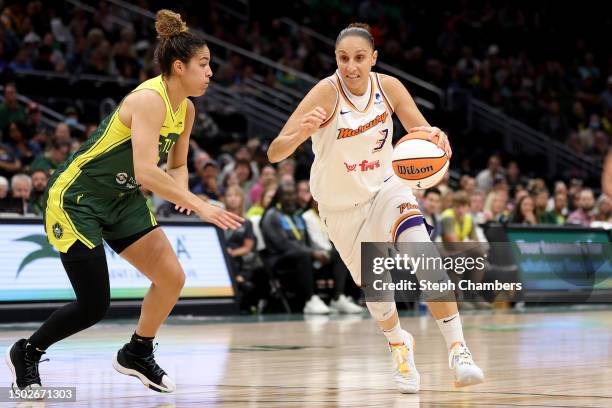 Kia Nurse of the Seattle Storm defends Diana Taurasi of the Phoenix Mercury during the first quarter at Climate Pledge Arena on June 24, 2023 in...