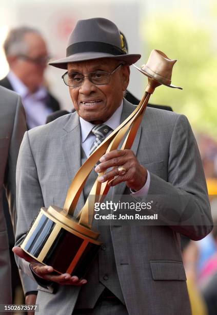 Willie O'Ree carries the Willie O'Ree Community Hero Award on the red carpet as he arrives at the 2023 NHL Awards at Bridgestone Arena on June 26,...