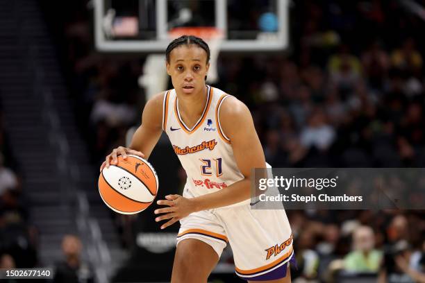 Brianna Turner of the Phoenix Mercury dribbles against the Seattle Storm during the third quarter at Climate Pledge Arena on June 24, 2023 in...
