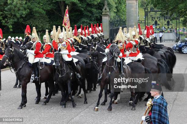 Household Cavalry horse rears up the Palace of Holyroodhouse during a National Service of Thanksgiving and Dedication to the coronation of King...