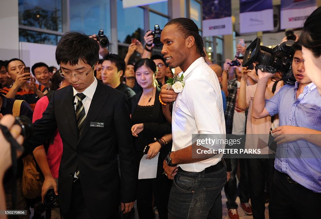 To go with AFP story Fbl-Asia-CHN-Drogba