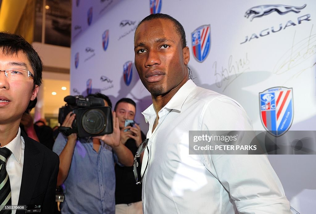 To go with AFP story Fbl-Asia-CHN-Drogba