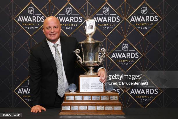 Head coach Jim Montgomery of the Boston Bruins poses with the Jack Adams Award during the 2023 NHL Awards at Bridgestone Arena on June 26, 2023 in...