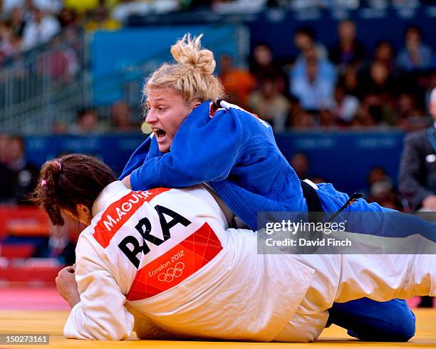 Kayla Harrison of the USA defeated Mayra Aguiar of Brazil by an ippon and wazari to reach the final during the Day 6 u78kgs Women's category at the...