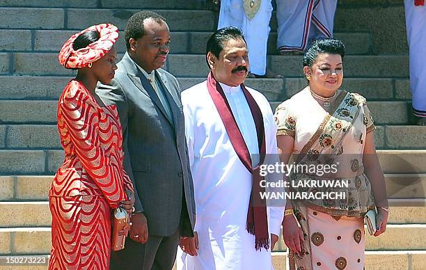 King of Swaiziland Mswati III and wife Inkhosikati Make Mahlangu poses for photographers with Sri Lankan President Mahinda Rajapaksa and Shiranthi...