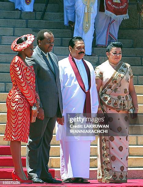 King of Swaiziland Mswati III and wife Inkhosikati Make Mahlangu poses for photographers with Sri Lankan President Mahinda Rajapaksa and Shiranthi...