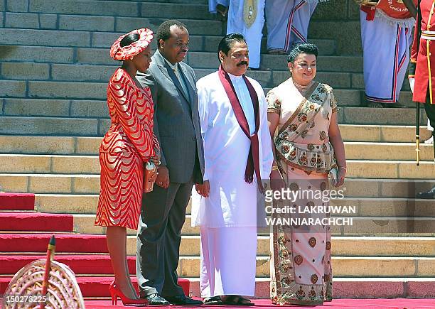 King of Swaiziland Mswati III and wife Inkhosikati Make Mahlangu poses for photographers with Sri Lankan President Mahinda Rajapaksa and Shiranthi...