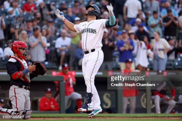 Eugenio Suarez of the Seattle Mariners celebrates his home run during the fourth inning against the Washington Nationals at T-Mobile Park on June 26,...