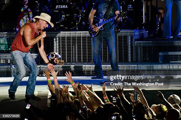 Kenny Chesney performs on stage at FedEx Field as part of the Brothers of the Sun 2012 tour.