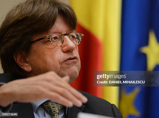 Erik De Vrijer, Chief of International Monetary Fund mission to Romania gestures during a press conference at the National Bank of Romania in...