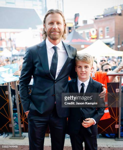 Dierks Bentley and son Knox are seen on the Red Carpet before the 2023 NHL Awards at Bridgestone Arena on June 26, 2023 in Nashville, Tennessee.