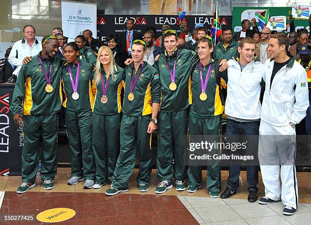 Olympic Medal winners including Chad le Clos greet fans during the South African Olympic team arrival and press conference at OR Tambo International...