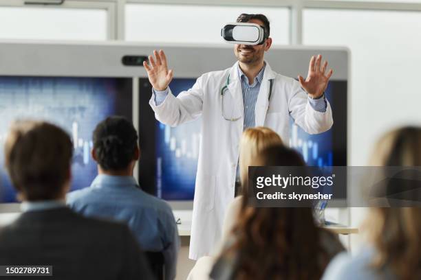 i can see the future of medicine through vr headset! - virtual reality simulator presentation stockfoto's en -beelden
