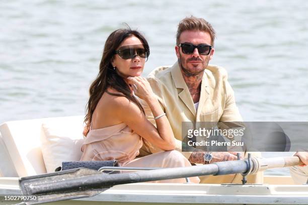 David Beckham and Victoria Beckham are seen during the "Le Chouchou" Jacquemus' Fashion Show at Chateau de Versailles on June 26, 2023 in Versailles,...