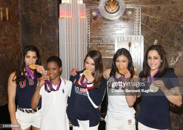 Women's Gymnastics Olympic Gold Medal Team Aly Raisman, Gabby Douglas, McKayla Maroney, Kyla Ross, and Jordyn Weiber pose with their medals at The...