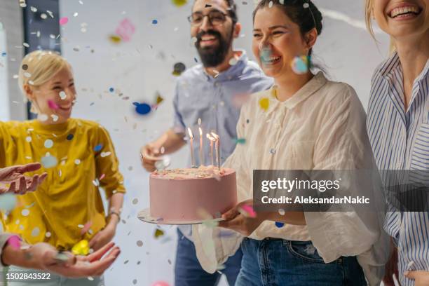 celebrating a birthday in the office - cake party stock pictures, royalty-free photos & images