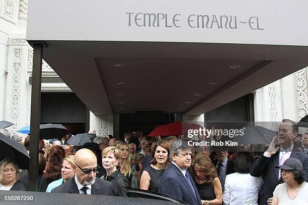 Atmosphere view of guests departing the funeral service for Marvin Hamlisch at Temple Emanu-El on August 14, 2012 in New York City. Hamlisch died in...