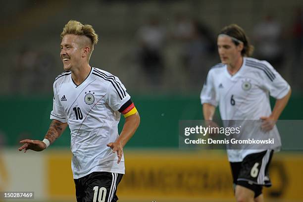 Lewis Holtby of Germany celebrates after scoring his team's fourth goal during the Under 21 international friendly match between Germany U21 and...