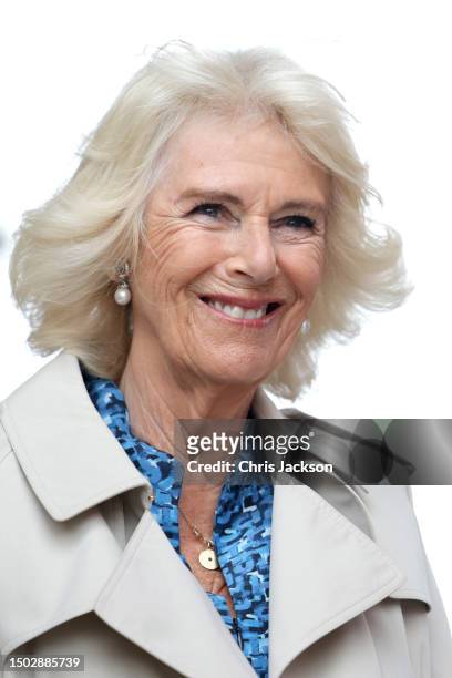 Queen Camilla smiles during a visit at Poundbury on June 27, 2023 in Dorchester, Dorset. The King and Queen are visiting the The Duchy of Cornwall's...