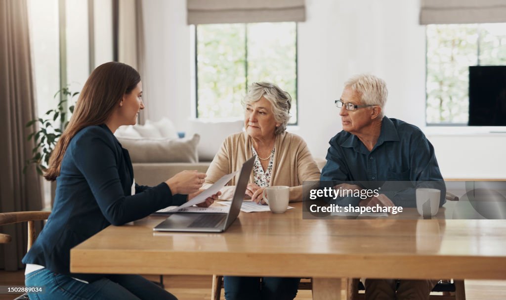 Senior couple, meeting and investment with a financial advisor, lawyer or woman consulting on a contract, loan or deal. Signature, documents and people with a mortgage, debt or saving in retirement