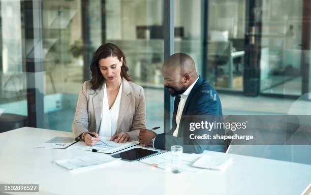 office, meeting and documents of business people, clients or team for taxes, audit or revenue report in accounting. paperwork, review and advice of woman, financial advisor or accountant support - barrister stockfoto's en -beelden