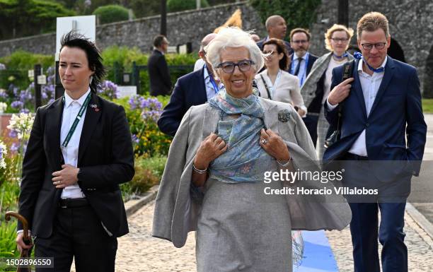 The President of the European Central Bank Christine Lagarde arrives accompanied by members of ECB security and participants in the morning session...