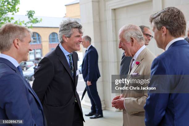 King Charles III meets Architect and interior designer Ben Pentreath during a visit at Poundbury on June 27, 2023 in Dorchester, Dorset. The King and...