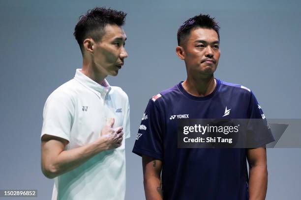 Lin Dan of China and Lee Chongwei of Malaysia talk during the Mix & Match event on June 27, 2023 in Shenzhen, China.