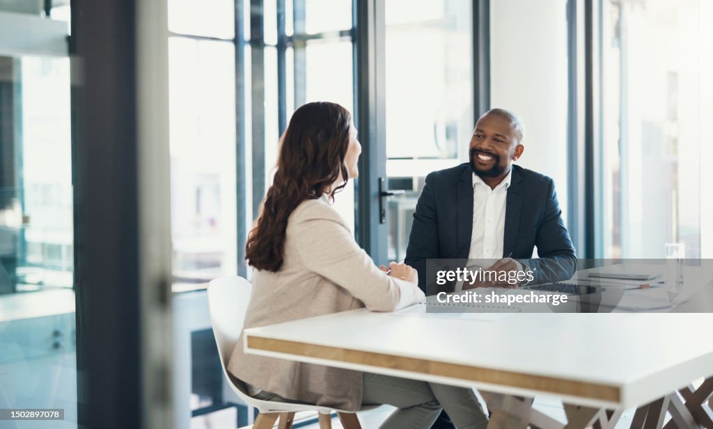Talking, meeting and business people, clients or partner discussion in finance, loan or consultant advice. Professional consulting woman, financial advisor or African man helping in b2b communication