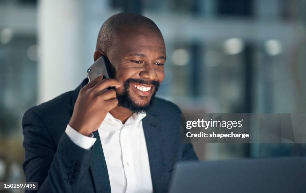 mature business man, night and phone call in office, smile or laptop for networking, stock market or research or. african investor, smartphone and computer for working late, communication and finance - financial advisor phone stock pictures, royalty-free photos & images