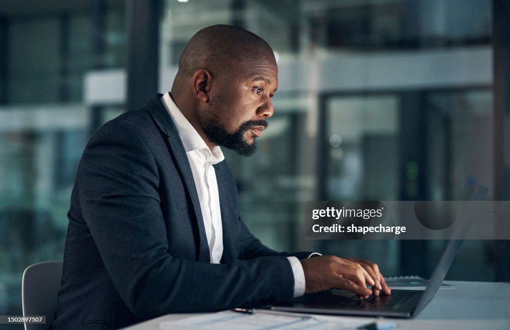 https://media.gettyimages.com/id/1502897507/photo/black-man-business-and-typing-on-laptop-at-night-accountant-working-overtime-at-office-and.jpg?s=1024x1024&amp;w=gi&amp;k=20&amp;c=5oS9heuGSso4adooj1Fr3o0H5qm7_WcLmaX6V3zDgXo=