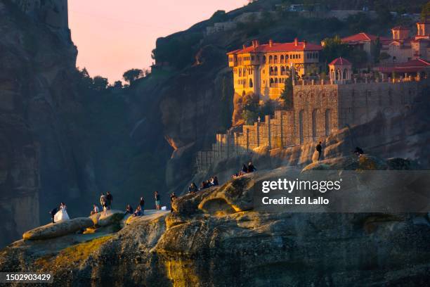 meteora monastery of st. varlaam at sunset - asceticism stock pictures, royalty-free photos & images