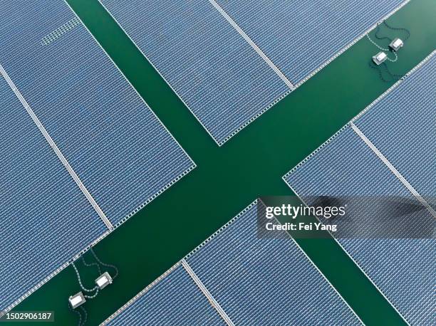 solar power station floating on water - solar powered station stock pictures, royalty-free photos & images