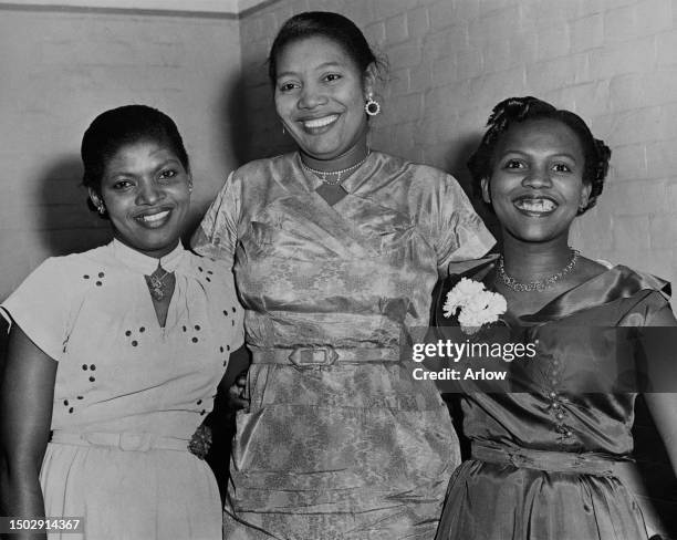 Vincentian student nurse Pearl Reddock, Vincentian student nurse Ruby Sardine, and Jamaican student nurse Mignon Kelly, all dressed up for an evening...