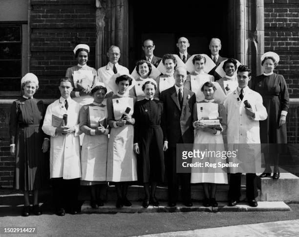 British doctor Sir Wilson Jameson with nurses after the Student Nurses' Prizegiving Ceremony at the Dreadnought Seamen's Hospital in Greenwich,...