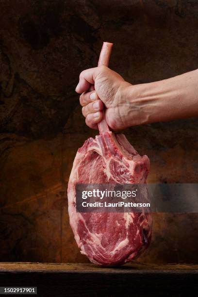 the king of steaks "the tomahawk" - tomahawk stock pictures, royalty-free photos & images