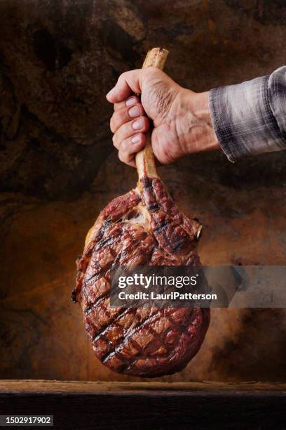 the king of steaks "the tomahawk" - tomahawk stock pictures, royalty-free photos & images
