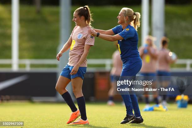 Sarina Wiegman, Head Coach of England, reacts with Ella Toone of England during an England Training Session at St George's Park on June 26, 2023 in...