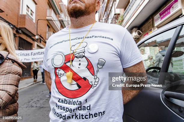 Group of people during a demonstration against dark kitchens on May 21 in Madrid, Spain. Convened by the Plataforma de Afectados por las Cocinas...