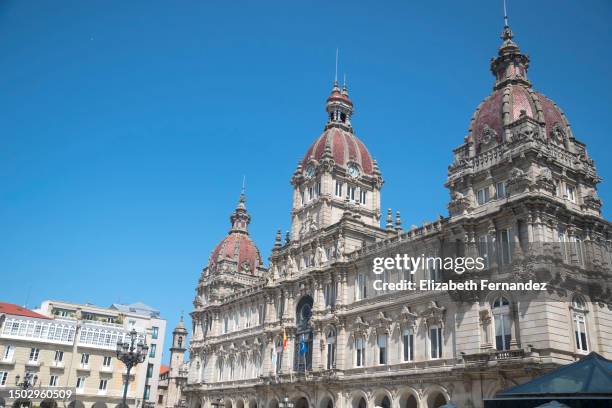 city hall in maria pita square at sunset, a coruna, spain - la coruña imagens e fotografias de stock