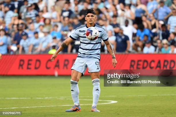 Alan Pulido of Sporting Kansas City controls the ball during a game between Chicago Fire FC and Sporting Kansas City at Children's Mercy Park on June...