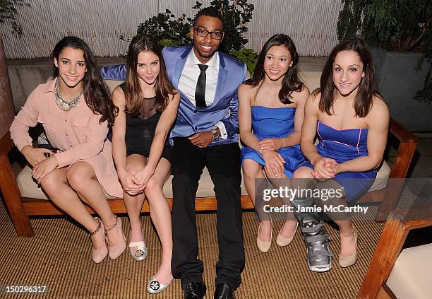 The gold medal-winning US Women's Gymnastics team Aly Raisman, McKayla Maroney, Kyla Ross and Jordyn Wieber with U.S. Competitive swimmer and Olympic...