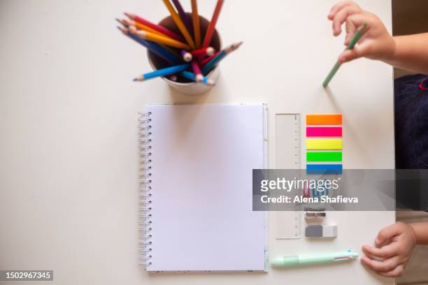 a set of stationery for a child's back to school. autumn, the beginning of new knowledge and education - report crime stock pictures, royalty-free photos & images