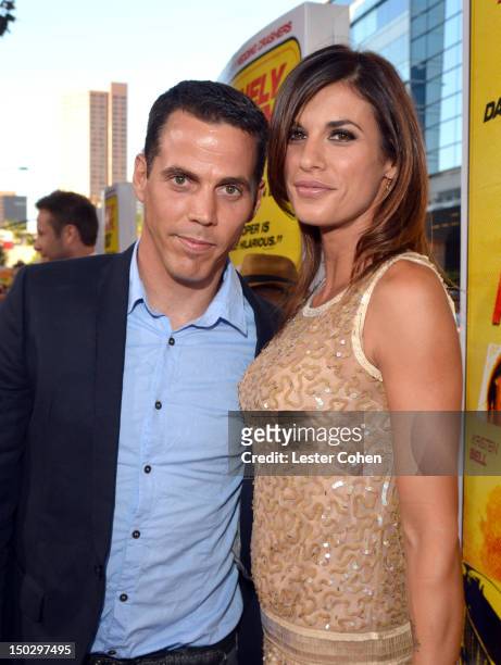 Steve-O and Elisabetta Canalis arrive at the Los Angeles premiere of "Hit & Run" on August 14, 2012 in Los Angeles, California.