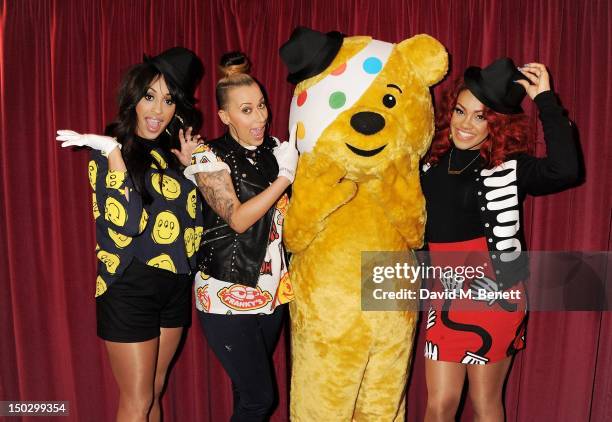 Alexandra Buggs, Courtney Rumbold and Karis Anderson of Stooshe attend 'BBC Children in Need: POP Goes The Musical' at the Prince Edward Theatre on...