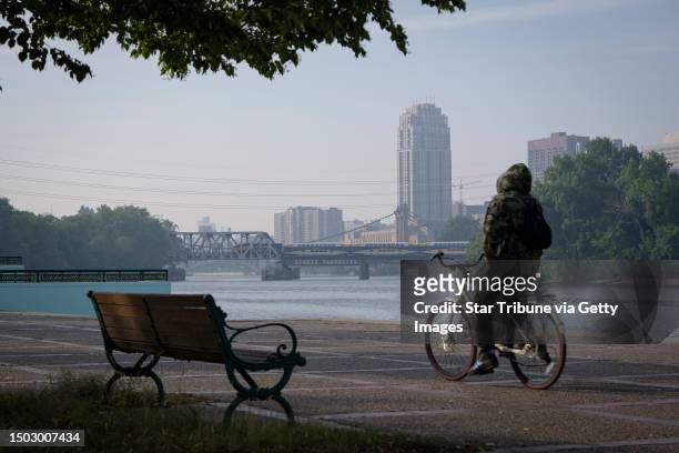 Smoke from Canadian wildfires is seen from Boom Island Park on Tuesday, June 27, 2023 in Minneapolis, Minnesota. Smoke from two different regions in...