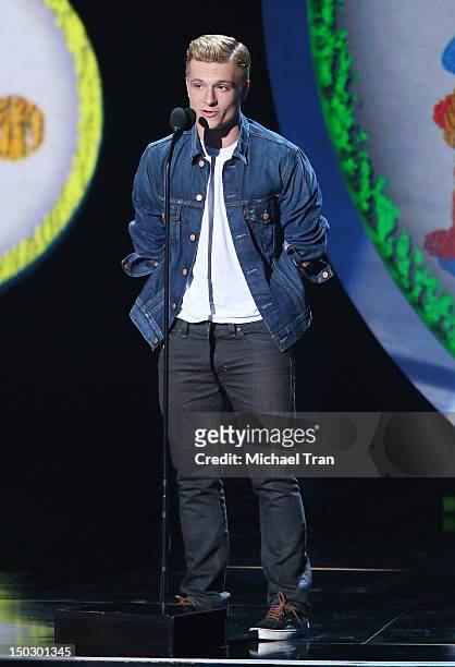 Josh Hutcherson speaks onstage at the "Teachers Rock" benefit event held at Nokia Theatre L.A. Live on August 14, 2012 in Los Angeles, California.