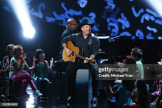 Garth Brooks performs onstage at the "Teachers Rock" benefit event held at Nokia Theatre L.A. Live on August 14, 2012 in Los Angeles, California.