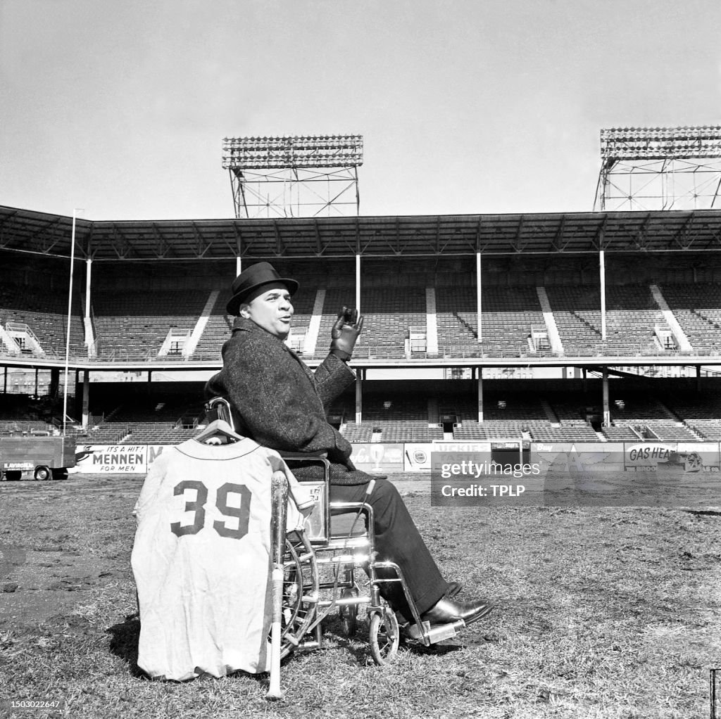 Former Brooklyn Dodgers catcher, Roy Campanella waves his hand in