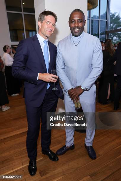Kris Thykier and Idris Elba celebrate the Global Premiere of "Hijack" at Skylon on June 27, 2023 in London, England. "Hijack” premieres globally on...